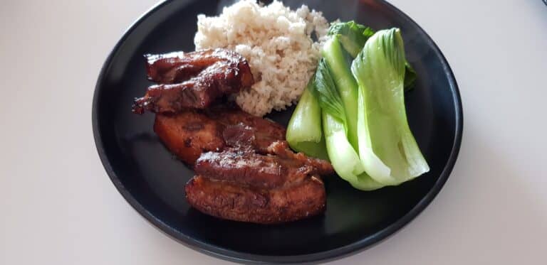 slow roasted sticky pork with rice asian greens