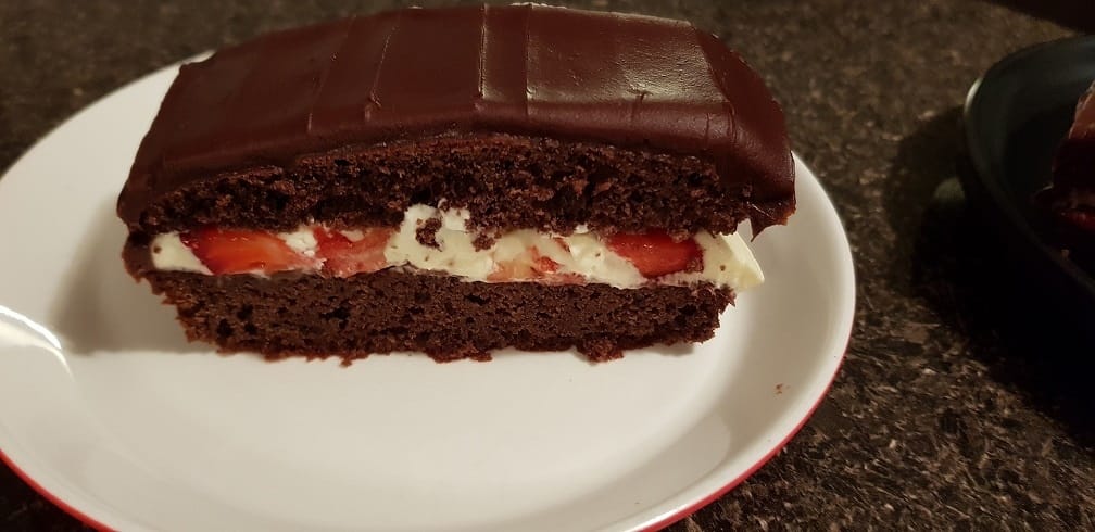 chocolate cake with ganache cream strawberries